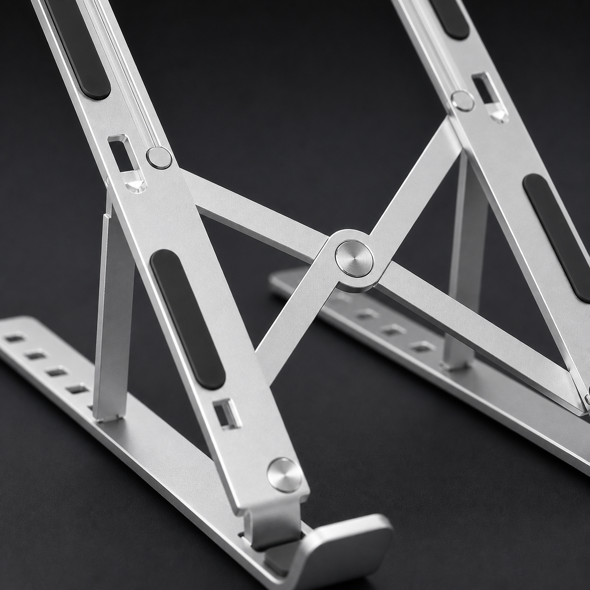 Detalle macro del aluminio aleado y las articulaciones del soporte Glowi